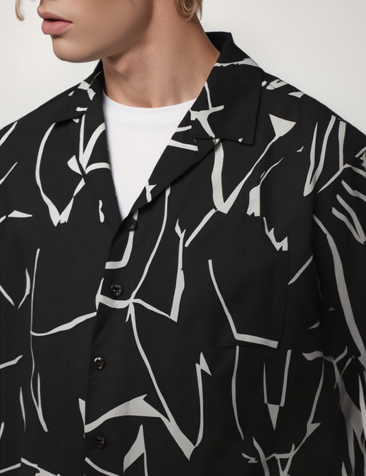 OLA FAN Black Cuban Collar Short Sleeve Shirt front side view on male model – minimalist high street wear