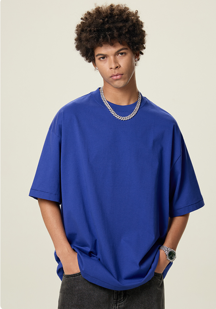 OLA FAN Blue vivid T-shirt front side view on male model – minimalist high street wear