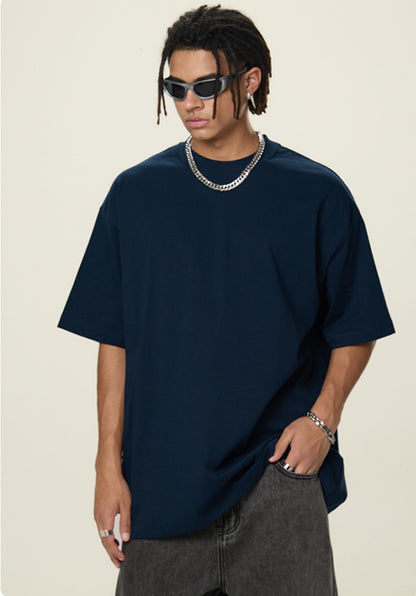 OLA FAN Dark Blue vivid T-shirt front side view on male model – minimalist high street wear