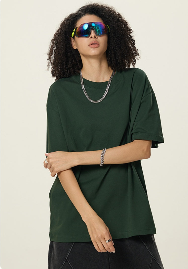 OLA FAN Dark Green vivid T-shirt front side view on female model – minimalist high street wear