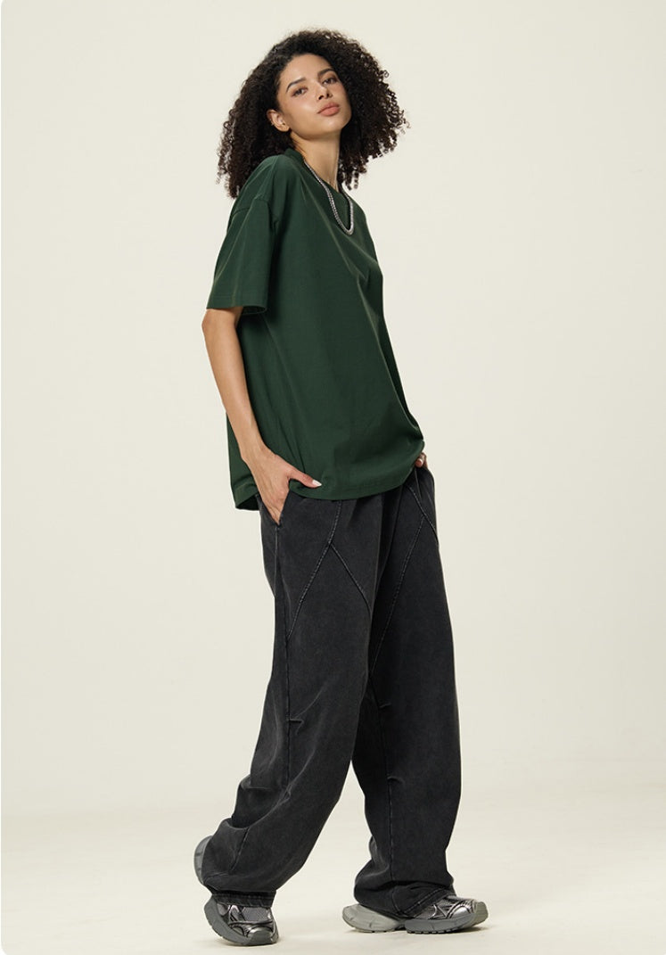 OLA FAN Dark Green vivid T-shirt side full view on female model – minimalist high street wear