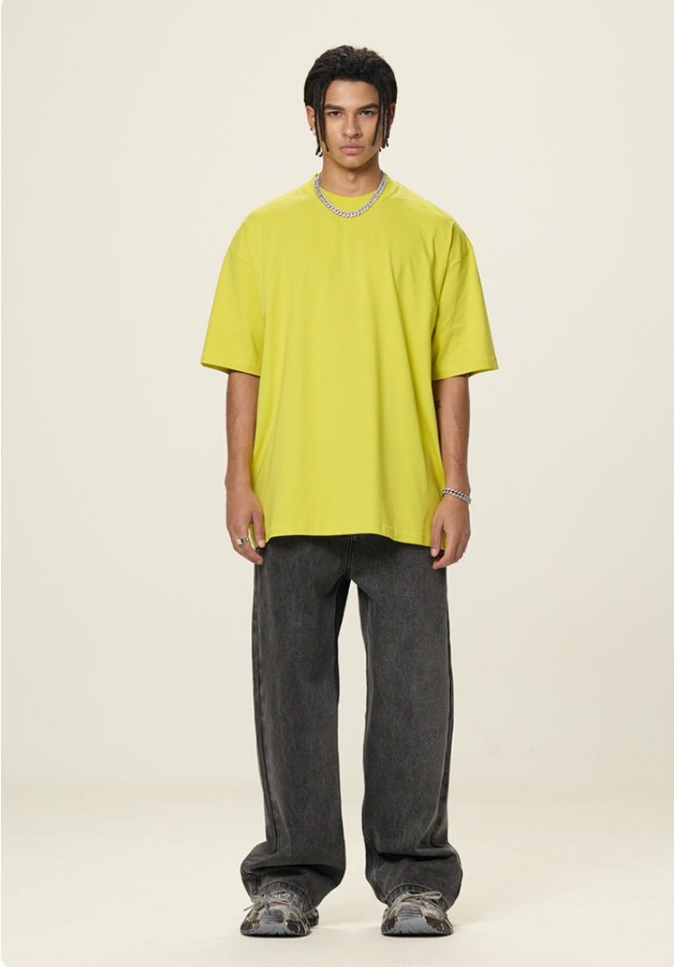 OLA FAN Lemon Yellow vivid T-shirt front full view on male model – minimalist high street wear