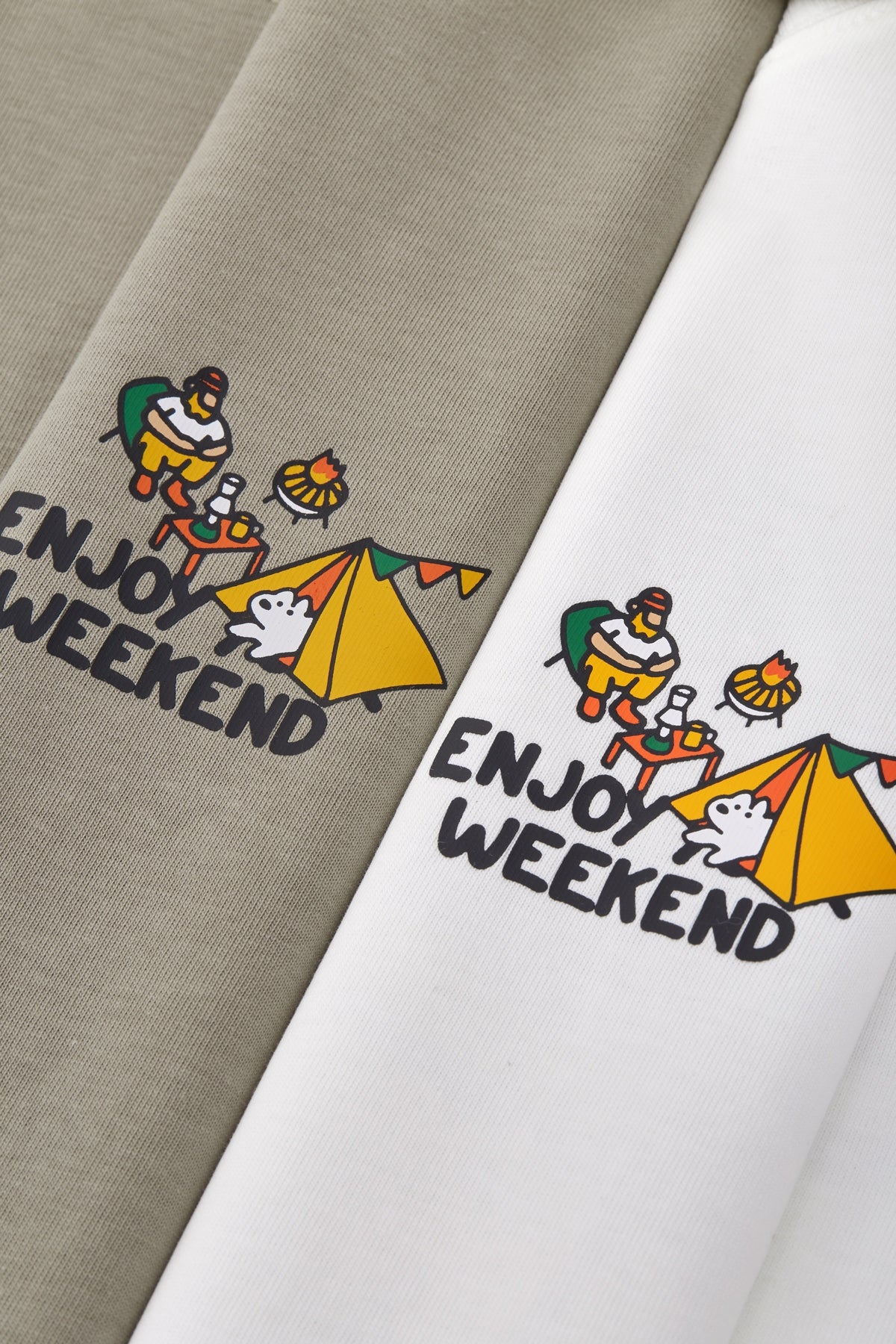 OLA FAN camp T-shirt material detail close shot–minimalist high street wear