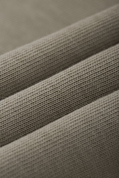 OLA FAN camp T-shirt material detail close shot–minimalist high street wear