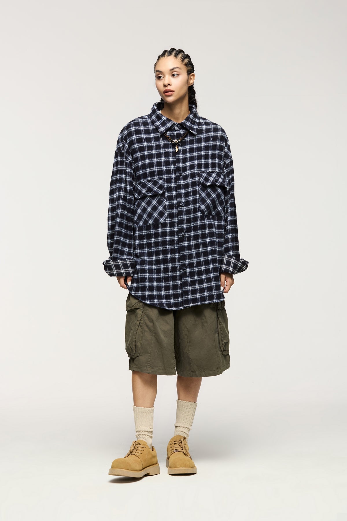 OLA FAN dark blue plaid shirt front full view on female model – unisex oversized fashion