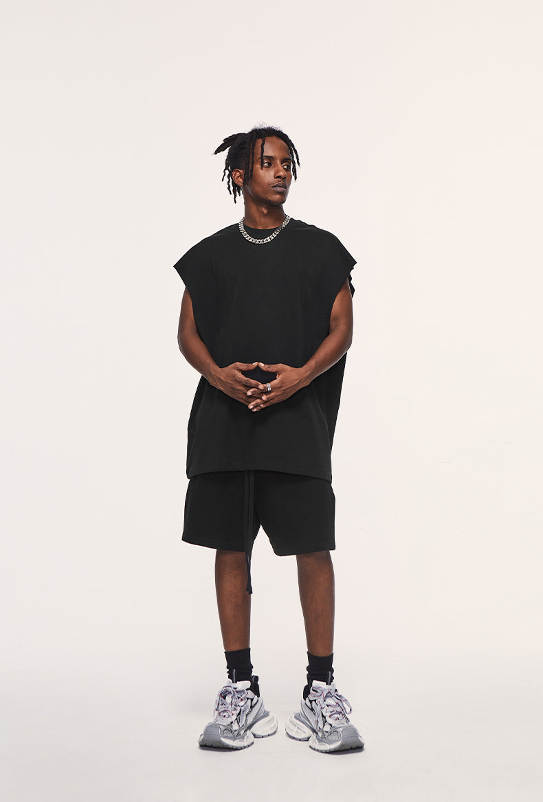 Front view of heavyweight unisex tank top by OLA FAN in black