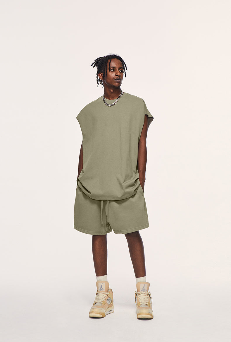 Front view of heavyweight unisex tank top by OLA FAN in grayish green