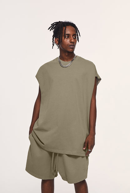 Front view of heavyweight unisex tank top by OLA FAN in grayish green