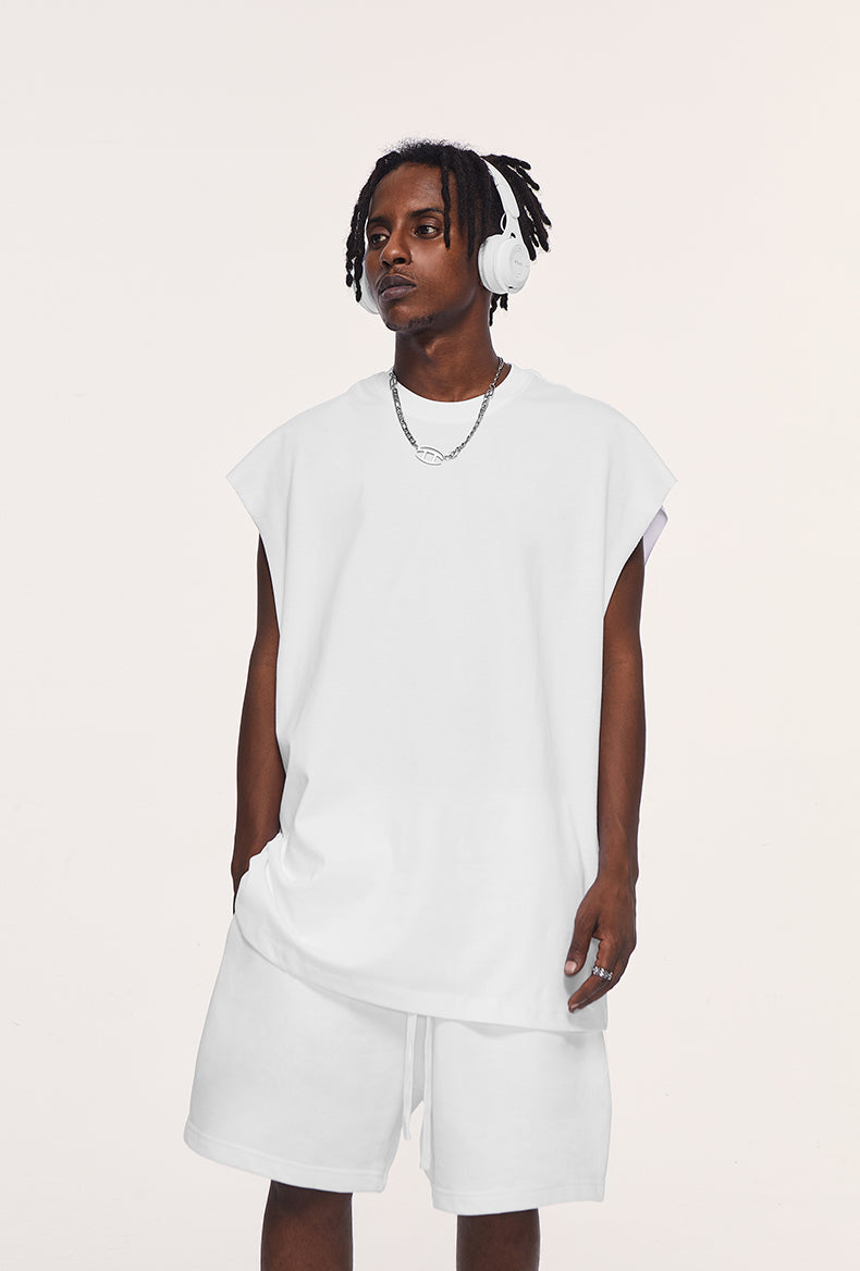 Front view of heavyweight unisex tank top by OLA FAN in white