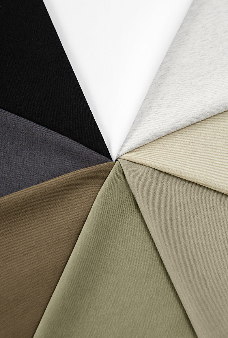 material view of heavyweight unisex tank top by OLA FAN in all colors