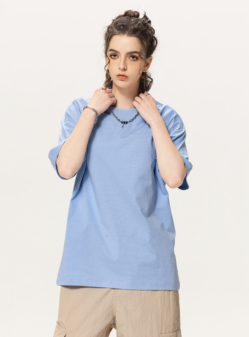 OLA FAN light blue vivid T-shirt front side view on female model – minimalist high street wear