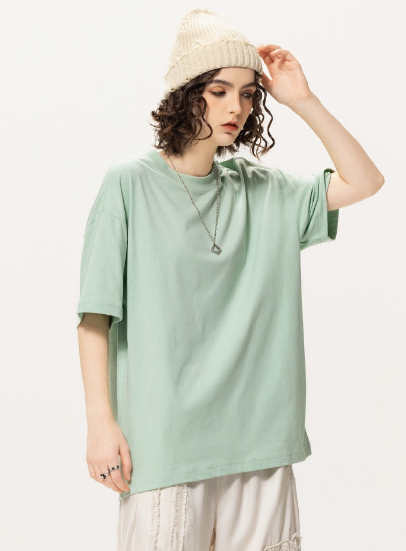 OLA FAN light green vivid T-shirt front side view on female model – minimalist high street wear